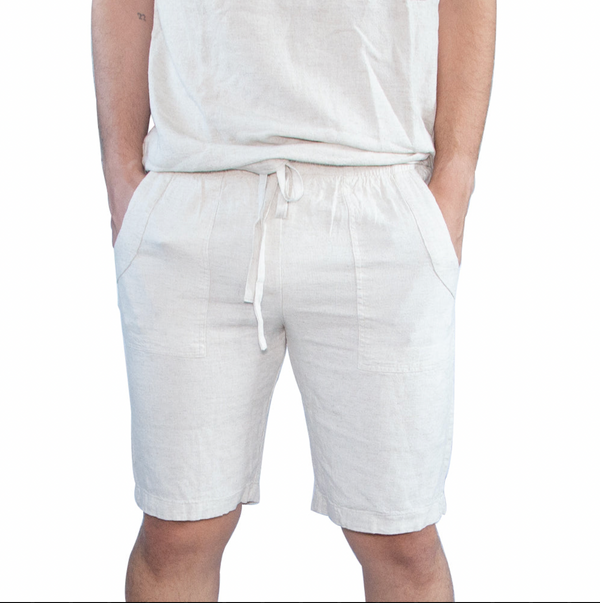 Model wearing beige linen bermuda shorts #Color_Beige